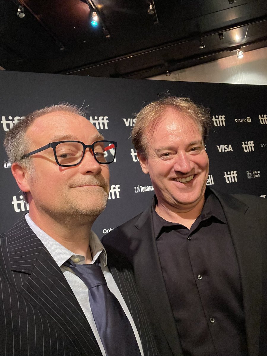 dhewlett's tweet photo. This is me and #TimWilliams. He looks nice enough, but he has the power to tear out your heart and reduce you to tears with his music composing genius…and he’s done just that with his beautiful #SwearingJar work! https://t.co/75801oBqCj