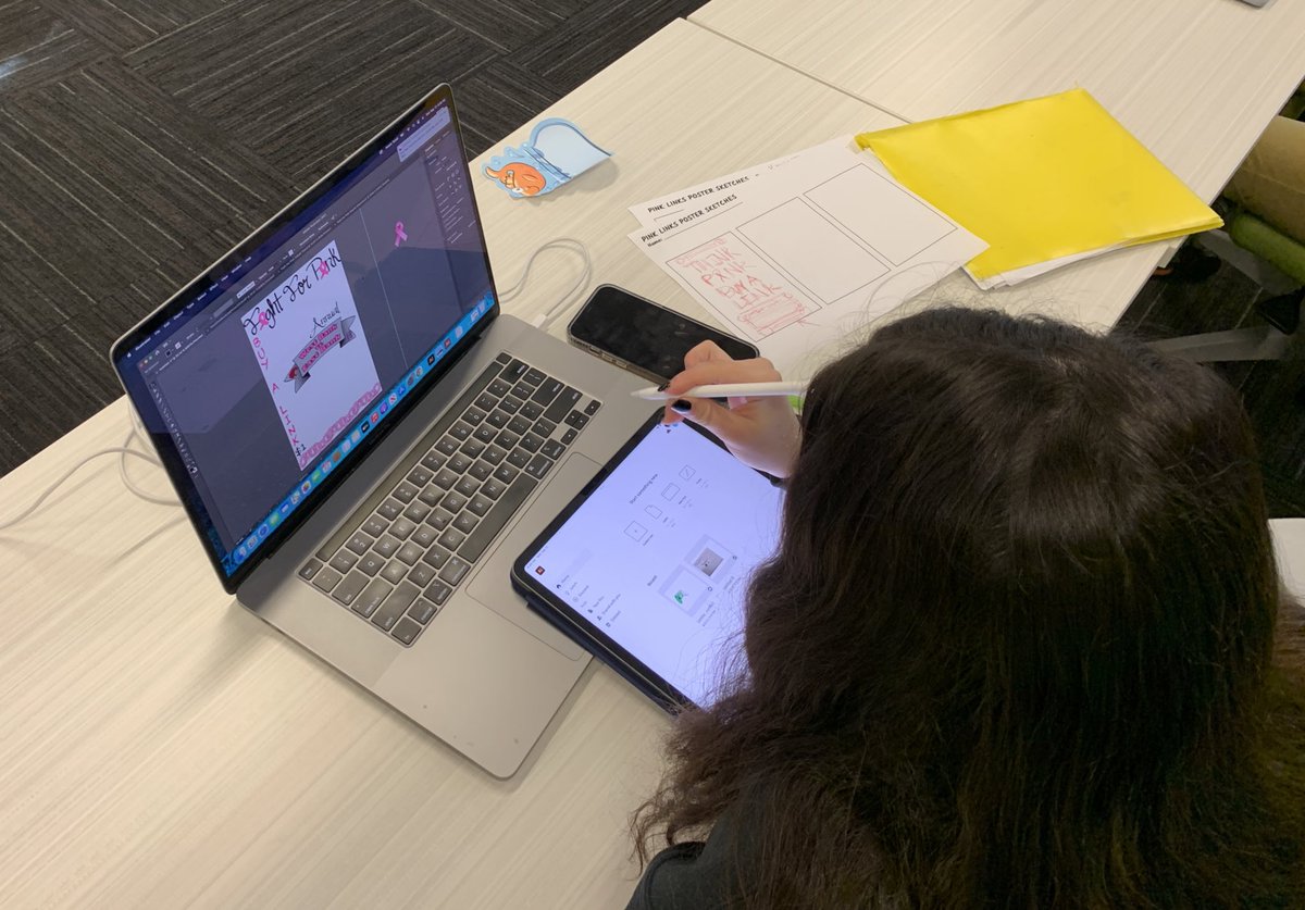 satellitecenter's tweet photo. Digital Media team members working on Pink Links flyers. Different methods are incorporated to achieve a variety of designs. #pinklinks #sketch #moodboards #photographs #tablets @AdobeForEdu @satcenterDM https://t.co/z5Td28oppt