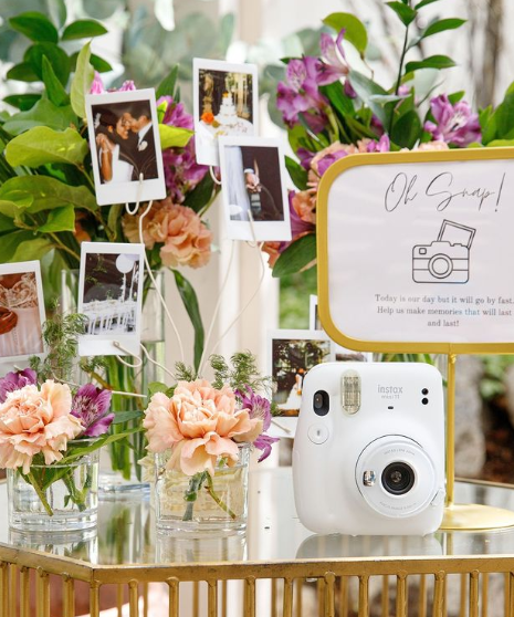 From FUJIFILM @instax: Currently obsessing over all the beautiful ways everyone is incorporating Instax on their special day💐🤍⁠ #DontJustTakeGive⁠ #Mini11Film⁠ #MiniFilm⁠ #InstaxFilm ⁠#WeddingSeason⁠ #WeddingDIY