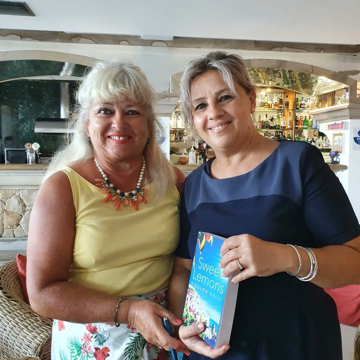fidelmawrites's tweet photo. Lovely presentation of copies of 'Sweet Lemons' to the Bar Library at Hotel Kalura. Guests can read a novel set in Cefalù while they're on holiday there. @PoolbegBooks, #Sicilia #sweetlemons. https://t.co/qqY2BVT7HM