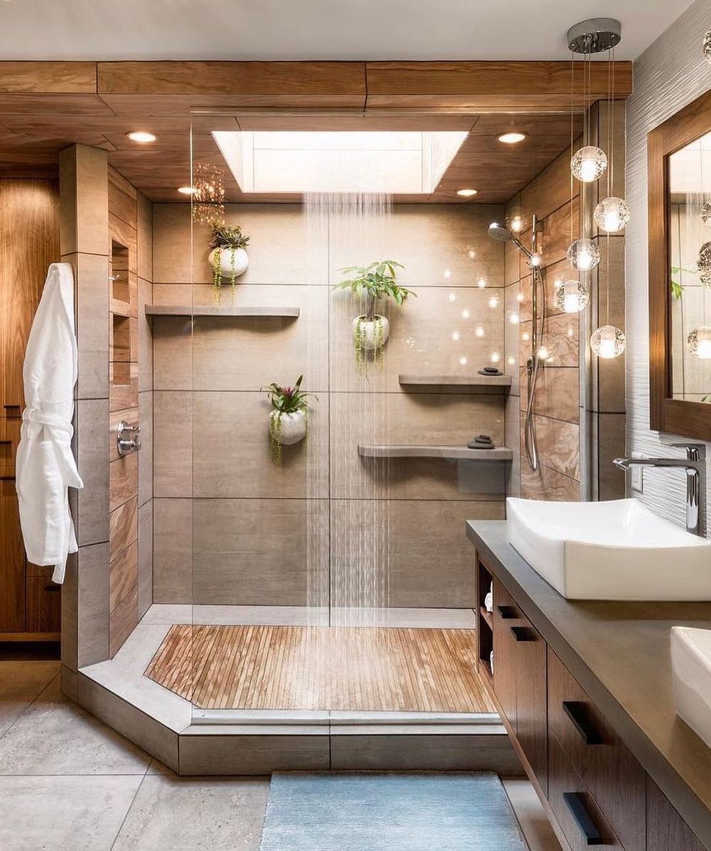 Elevate your shower experience with a luxurious waterfall. . . . #luxuryliving #luxurybathroom #interiordesign
