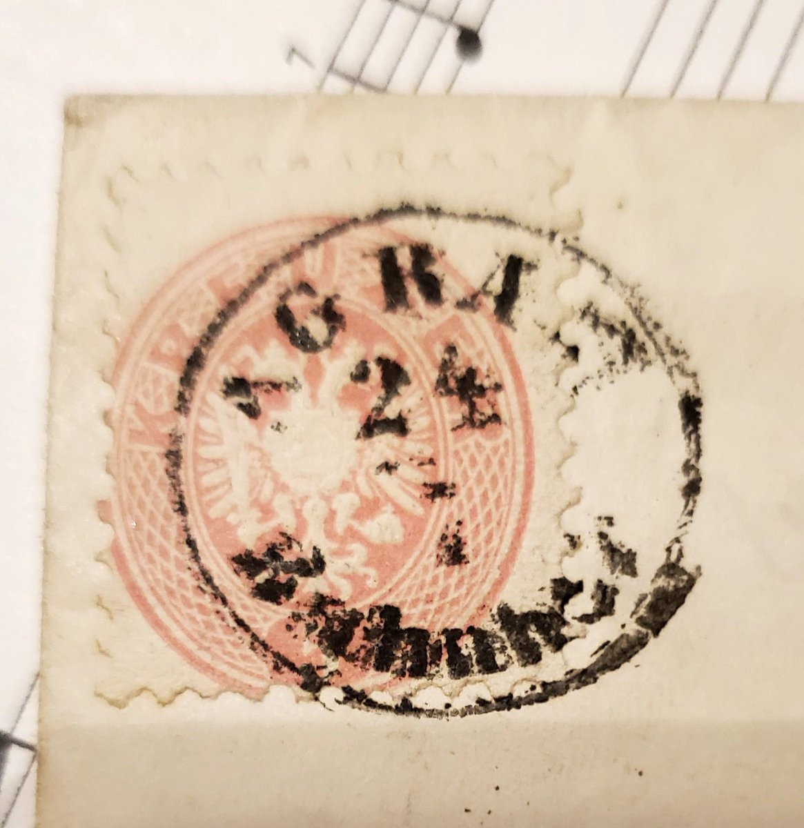 PhilatelicB's tweet photo. Can anyone tell me what this post mark says? I keep getting something about a fastener company in Italy. I know that's not right for a post mark 😂 The stamp is on a folded letter that I can't read, for now! #Philately #Stamplife https://t.co/8MVyYBb8wU