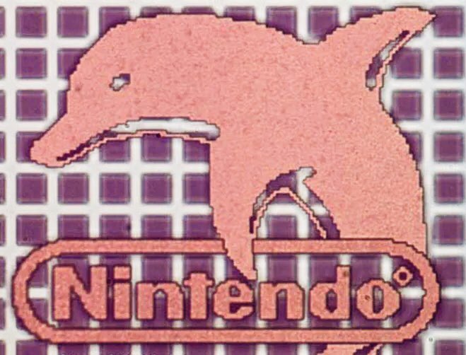 microscopicture's tweet image. silicon art on a nintendo microchip magnified 700x