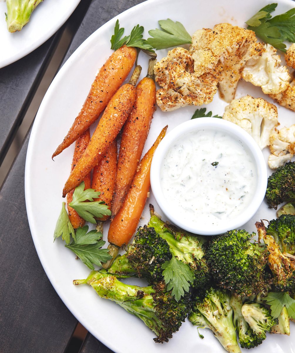 The Pi Blazed Veggies are a spicy treat: dry rub, oven-baked cauliflower, broccoli and carrots served alongside a yummy yogurt cucumber dressing.