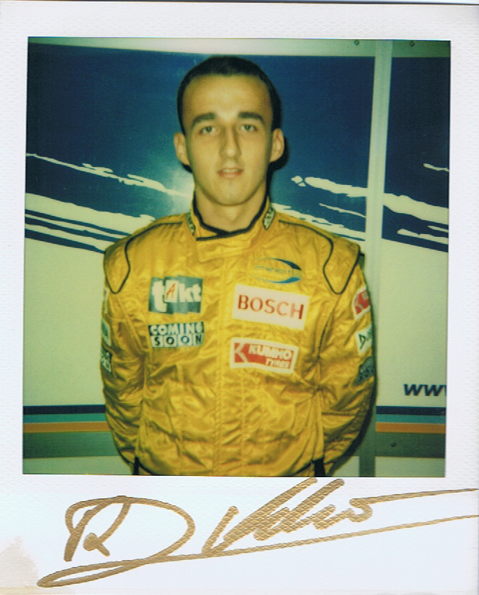takahiko_nkjm's tweet photo. In 2003 #MastersF3 at #Zandvoort I met @R_Kubica first time. At there I took him with #Polaroid . On 2022 @FIAWEC @fiawec_fuji #6HFuji I could met #Kubica again. Time had passed. But his smiles are never changed!! Thank you so much Robert!! Something had changed his #autograph https://t.co/bZDyr4nU7W