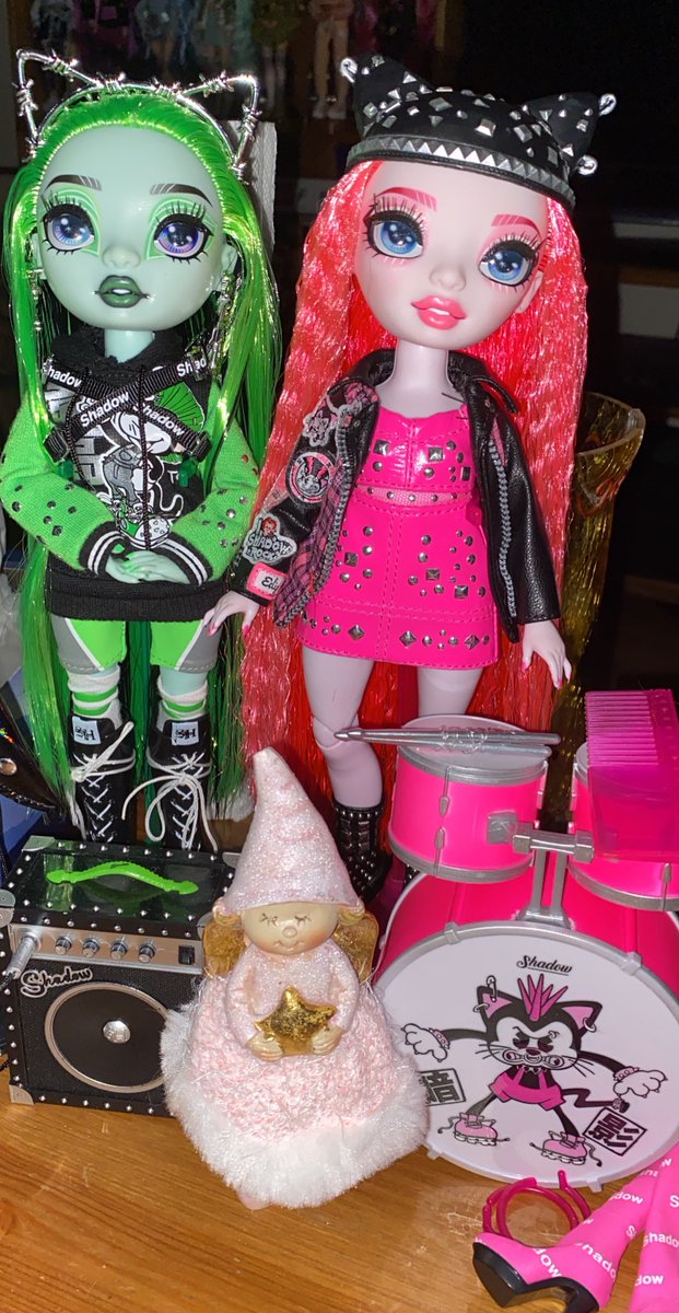OolaFanForever's tweet photo. Introducing my second #NeonShadow doll, #MaraPinkett, the drummer of the band. #RainbowHigh #ShadowHigh Beautiful face sculpt, an adorable cat-eared hat, pink under-toned skin, crimped hair, a set of drums, 2 outfits (1 pair of flawed boots, ugh). Mara is lovely. A great find. ❤️ https://t.co/Y29ftw10vo