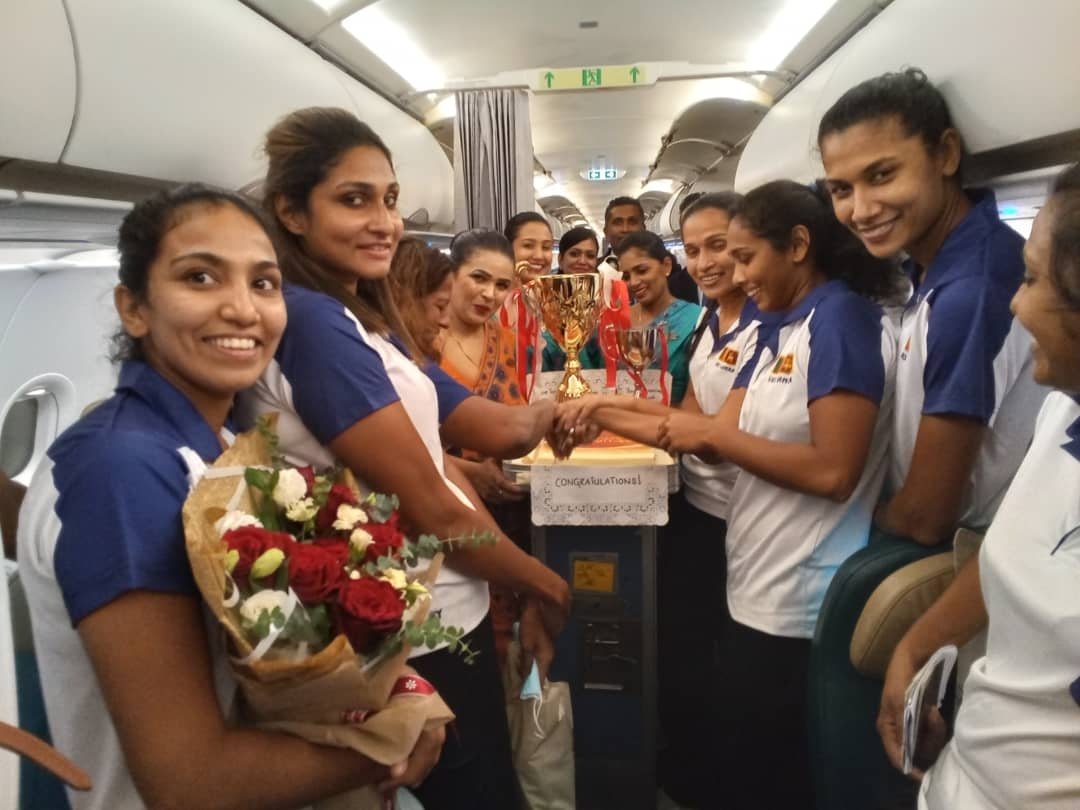flysrilankan's tweet photo. We are honoured to have onboard with us, the Sri Lankan Netball team who emerged the Asian Netball Champions for the 6th time. Before they touch down to be engulfed by all the love of our nation, here we are, celebrating at 30,000 ft, the glory brought in the name of Mother Lanka https://t.co/UKCdwxQrqw