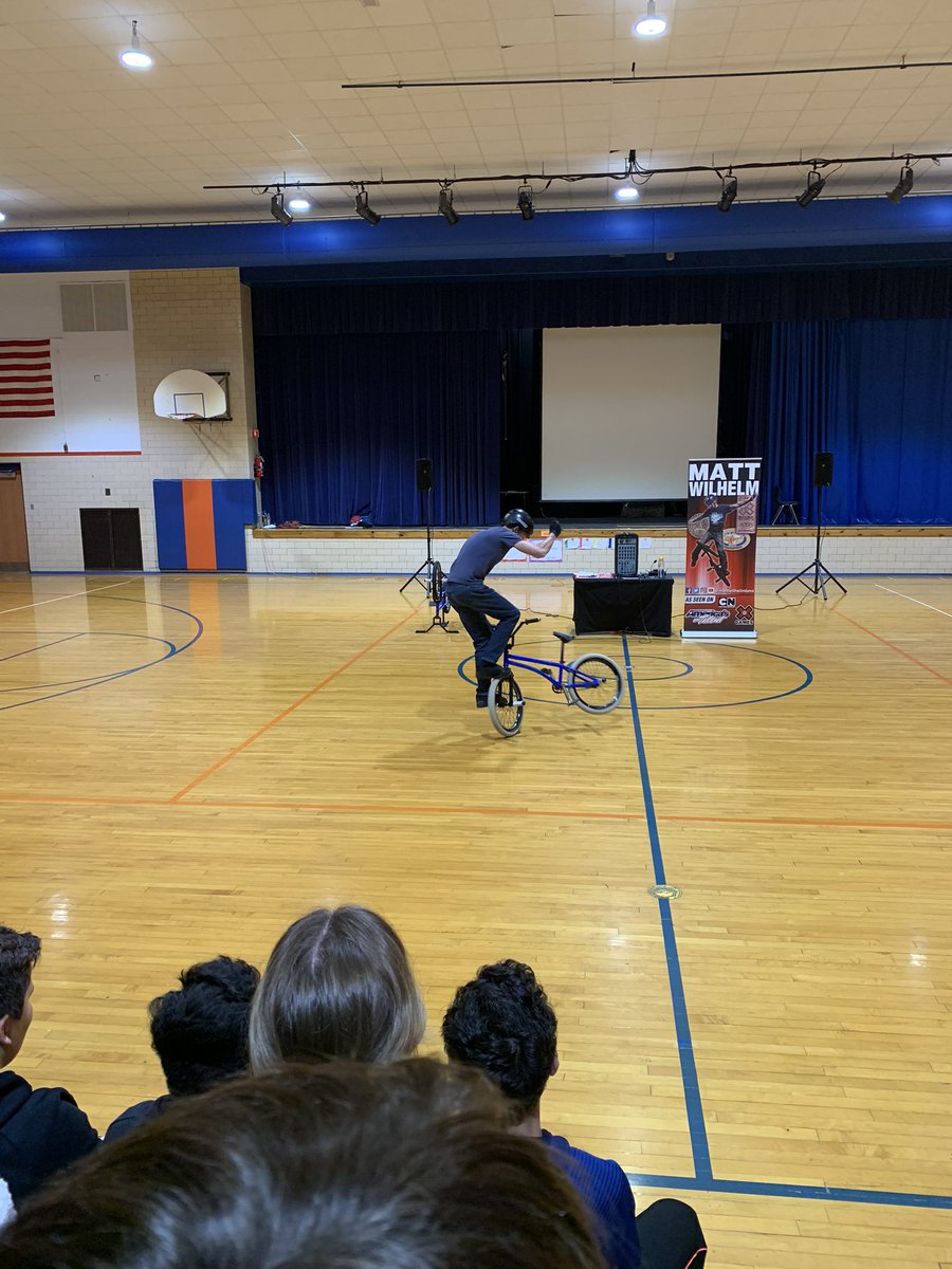 Math2TheFuture's tweet photo. @mattwilhelmbmx never disappoints! Great tricks and an even better message for our students today, “Be somebody’s Batman.” #gkcogs #BeYounique https://t.co/5GonxPCQVs