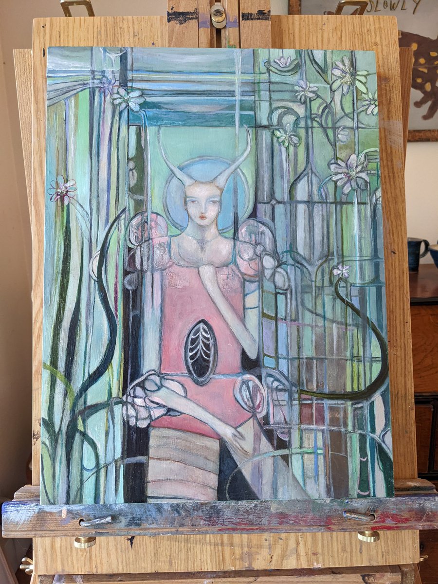 my sister's painting finally arrived. she just had a few touch ups to make and here we are 9 months later lol it reminds me of a thoth tarot card