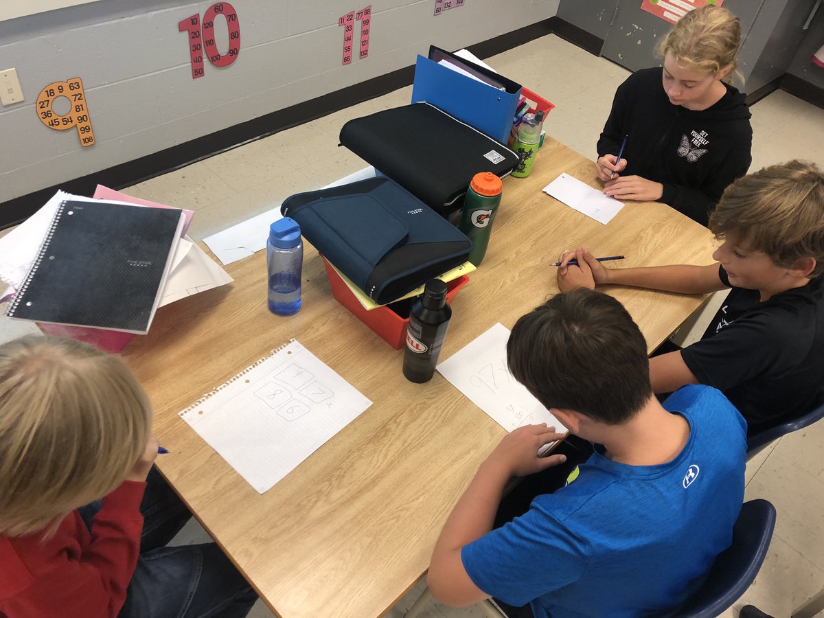sttcatholic's tweet photo. Gr. 6/7 students are engaged in a math task that challenges them to work collaboratively in groups to solve the problem. #buildingcommunity #openendedmath https://t.co/zSM0UB0zbh