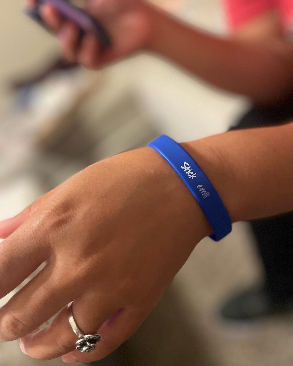 MCEwrestling's tweet photo. Stop by the Wrestling table at the block party Wednesday at 5pm in the bus lanes! 🔥  Buy a bracelet ($3) or a t-shirt ($5)!!! The bracelet says “Stick ‘em!!!” It means “pin him!” 🔥  Support us this season and yell “Stick ‘em!!!!” from the stands! @McEachernSports @McEachernHigh https://t.co/8GwQu71ErJ