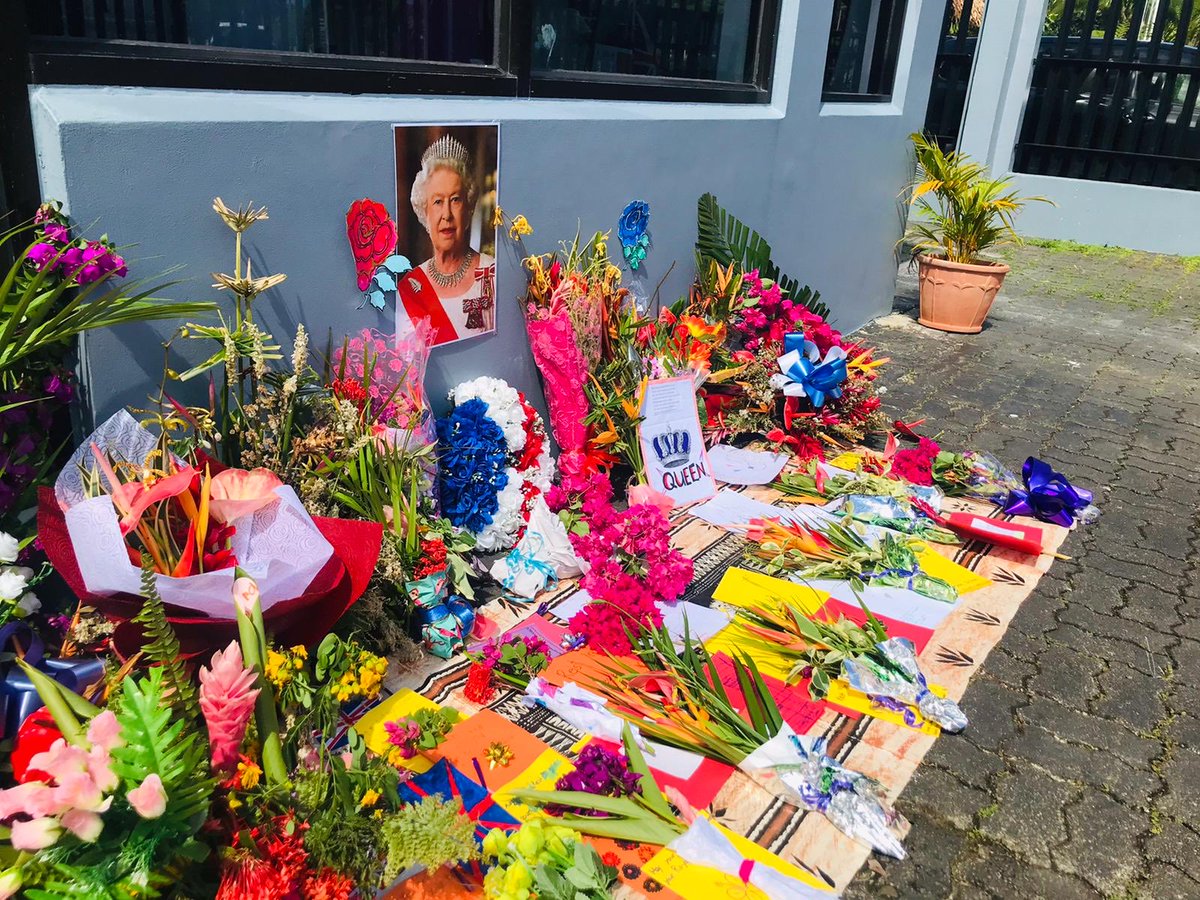 PaulWelsh_UK's tweet photo. Local schoolchildren in Suva have prepared a beautiful tribute to Her Majesty The Queen. They made cards and drawings. They also brought a beautiful piece of Masi - a local symbol of esteem and respect. It sits outside ⁦@ukinfiji⁩ https://t.co/1IcrurtojB