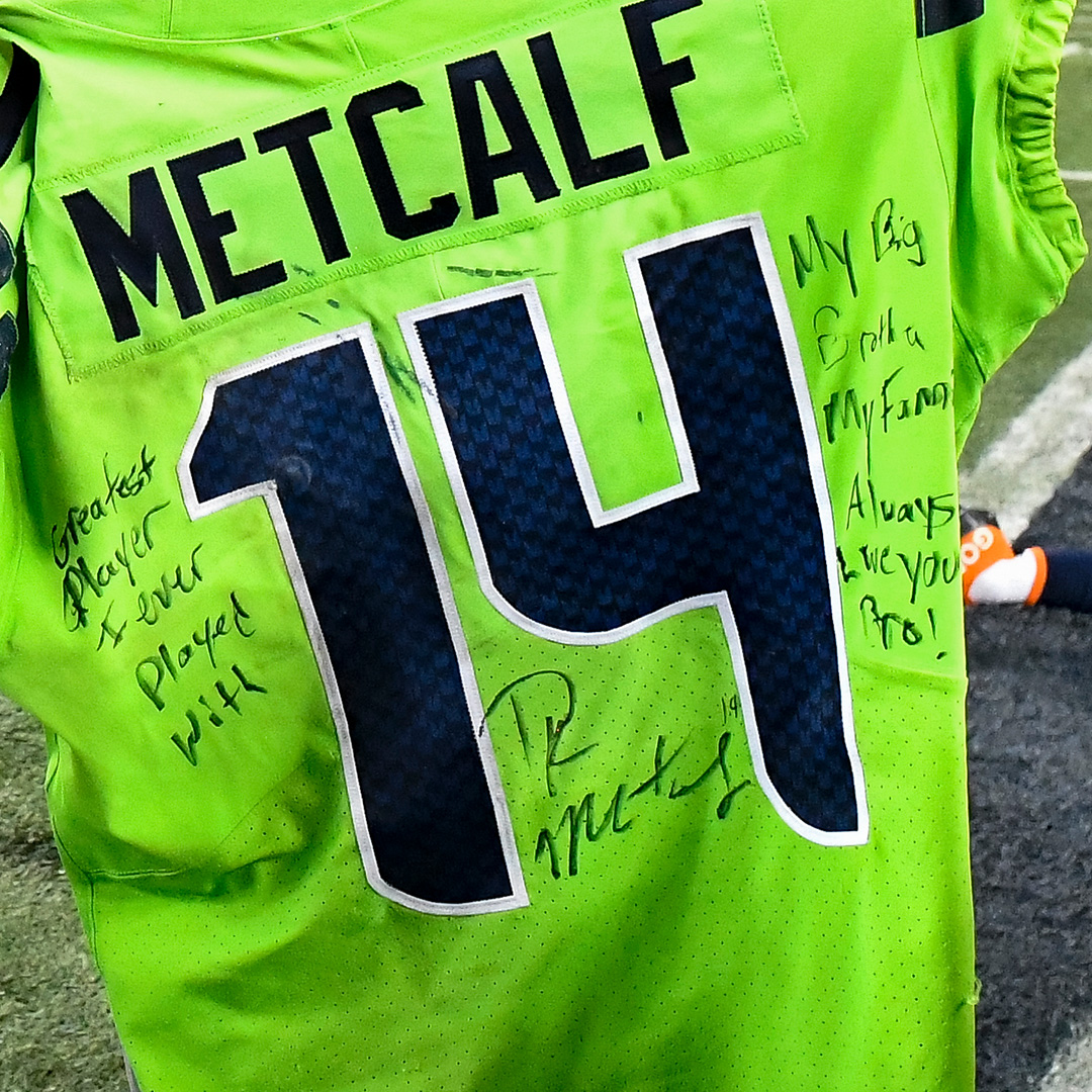 NFL on X: ''Greatest player I ever played with.' The jersey swap messages  between @dkm14 and @DangeRussWilson ❤️  / X