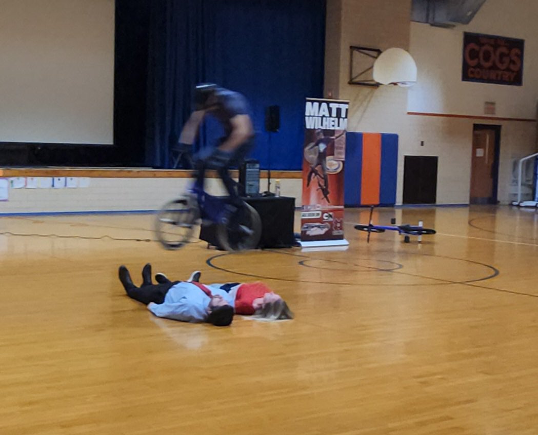 Mr. Butcher and I were the “lucky” ones picked to get jumped over. Thankfully, they voted for Mr. Butcher to be in the “dangerous” spot 😜 Fun assembly, better message! #gkcogs