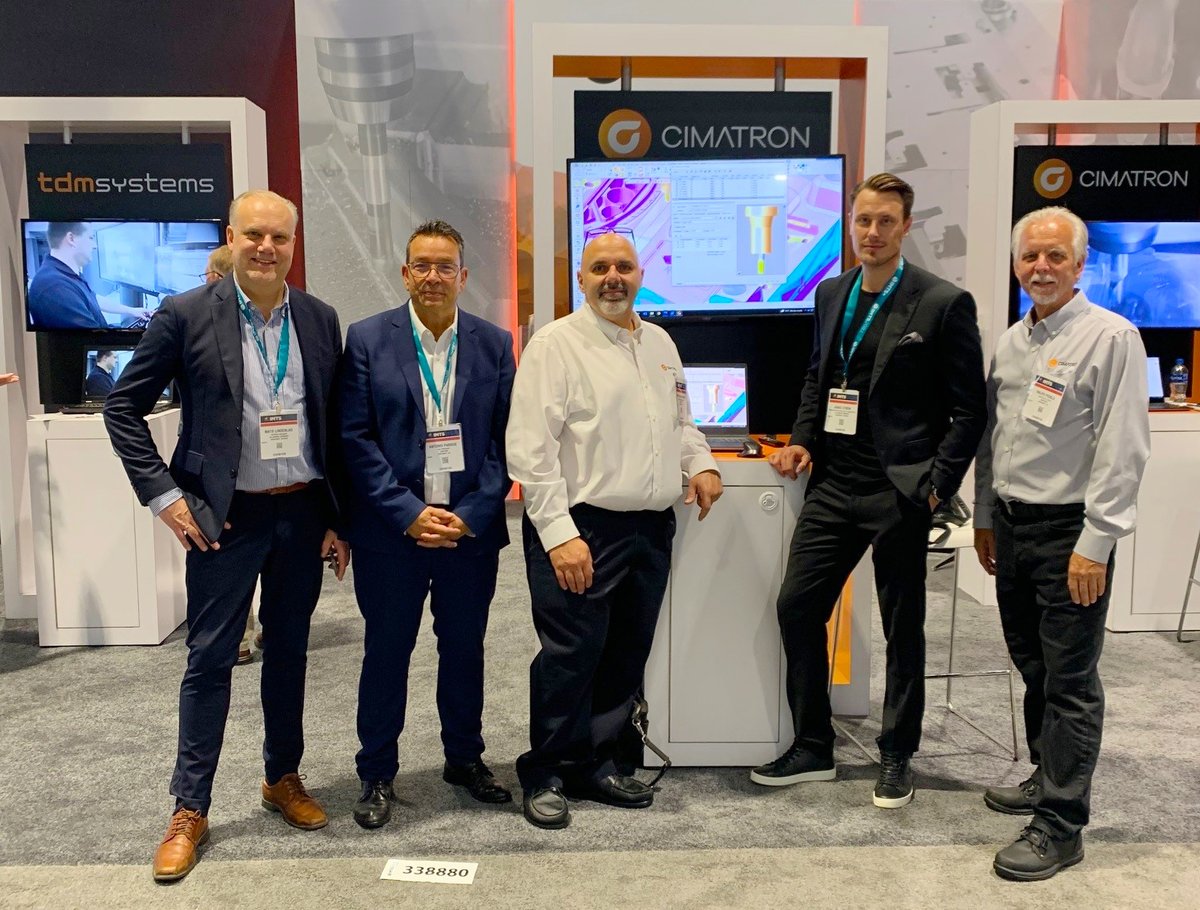 Cimatron's tweet photo. Day 2 of #IMTS2022 and we have been joined by Jonas Ström and Mats Lindeblad from @SandvikCoromant. The Cimatron team are waiting for you, so please stop by booth 338880 and see what we have to offer, including our sister companies #GibbsCAM, #TDMSystems, and #CGTech https://t.co/x7mjQKOmRj