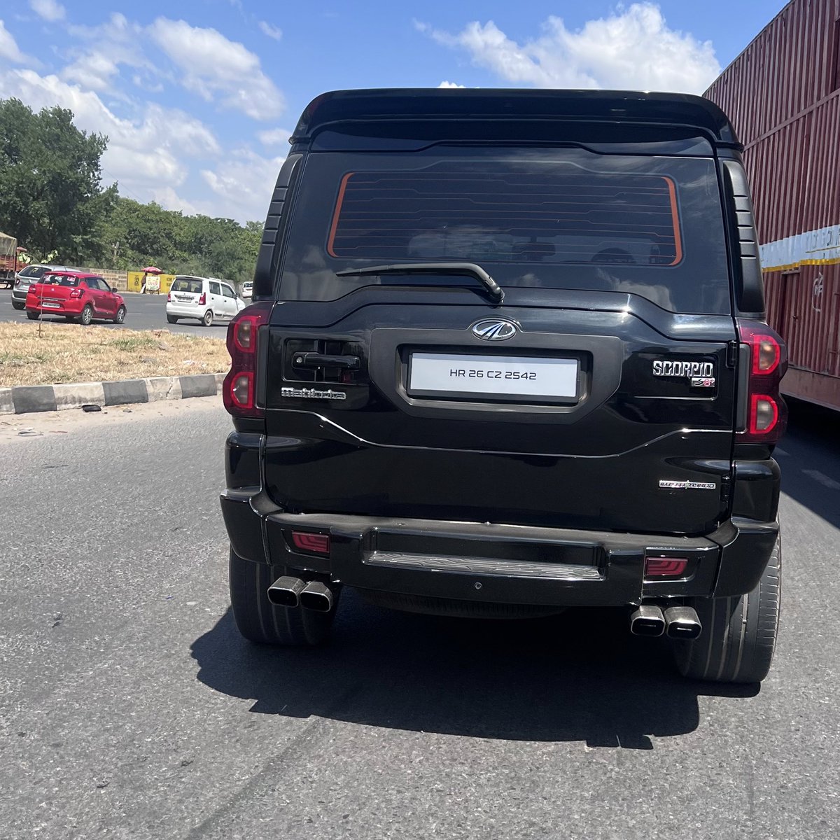 Scorpio with black tinted glasses and without HSRP plate ! Are traffic rules only to be followed by middle class !  <a href="/TrafficGGM/">Gurugram Traffic Police</a> Is no traffic staff on ground that issues challan for it  ! We have not forgotten Nirbhaya yet ! Location :- Rajeev Chowk highway  At 12:40 P.M TODAY