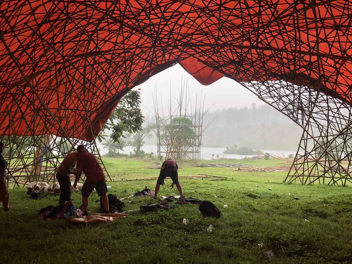 Building a bamboo tower <a href="/NyegeNyegeFest/">Nyege Nyege</a> when rain hits luckily the dome is already up! Come to the festival and see the result. #ecofriendly #bamboo #bamboostructures <a href="/INBARofficial/">INBAR</a>