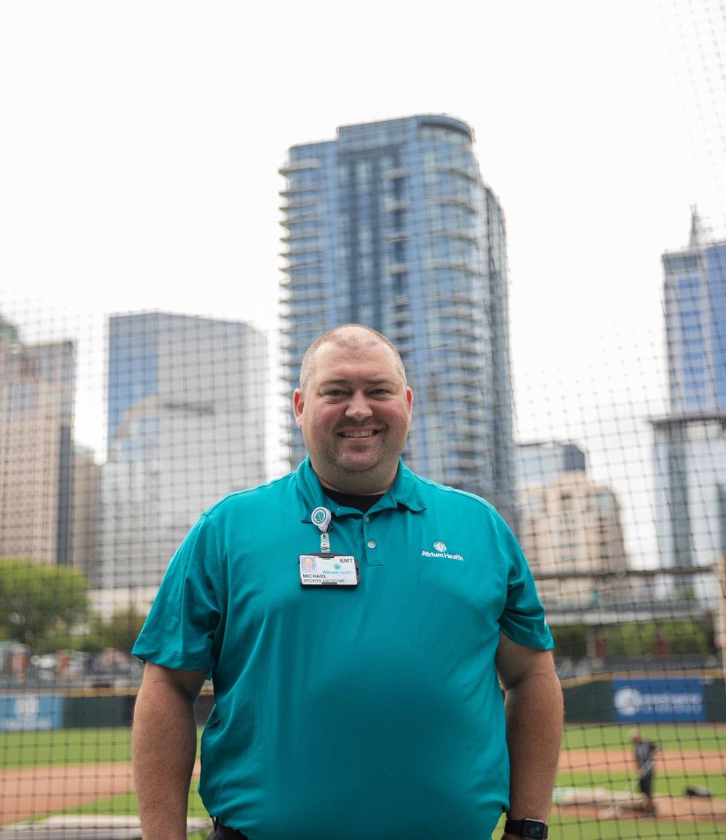 AtriumHealth's tweet photo. .@AtriumMSKI physician Dr. Eric Warren and #AtriumHealth EMT Michael Weber get to work with their favorite athletes ⚾ 

Learn more about how @KnightsBaseball and Atrium Health's event medicine team have hit a grand slam of a partnership since 1976 ➡️ https://t.co/VsR1G0GOXk https://t.co/JsR0O6AbKu