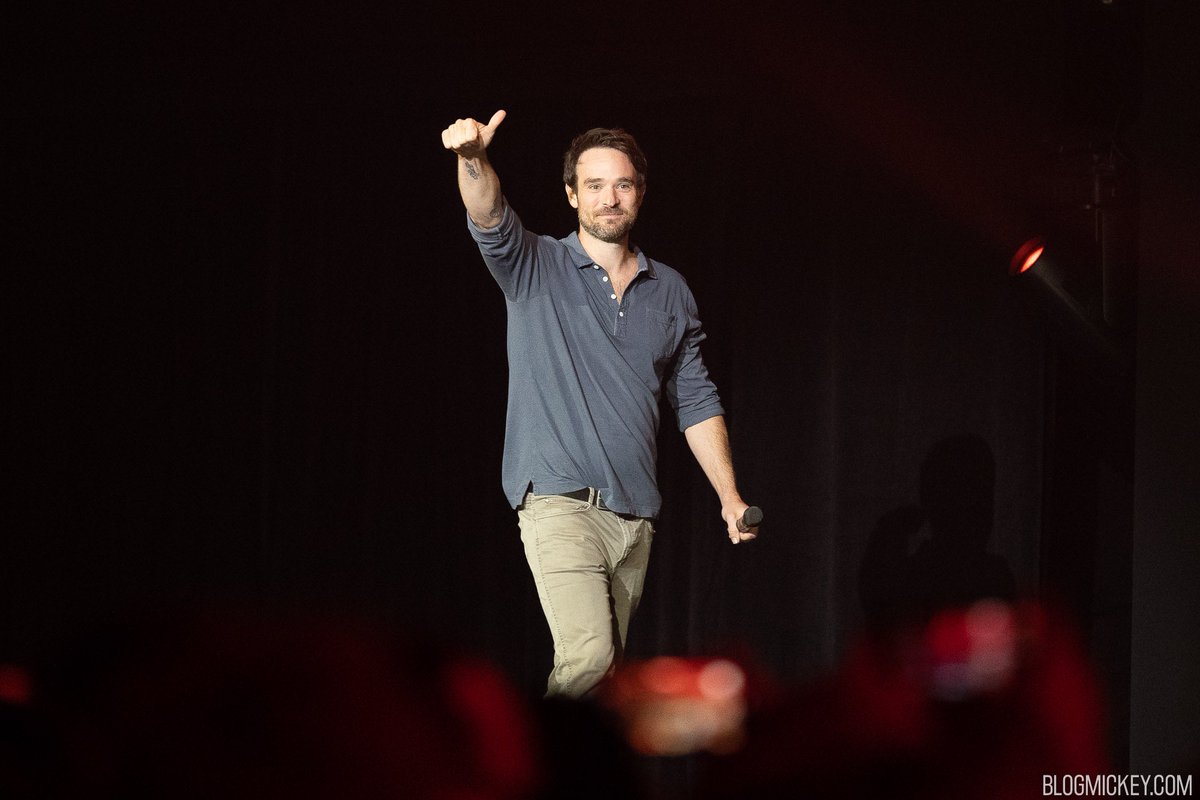 Charlie Cox gives a thumbs up as he walks across the stage at D23Expo. Photo credit: BlogMickey.com