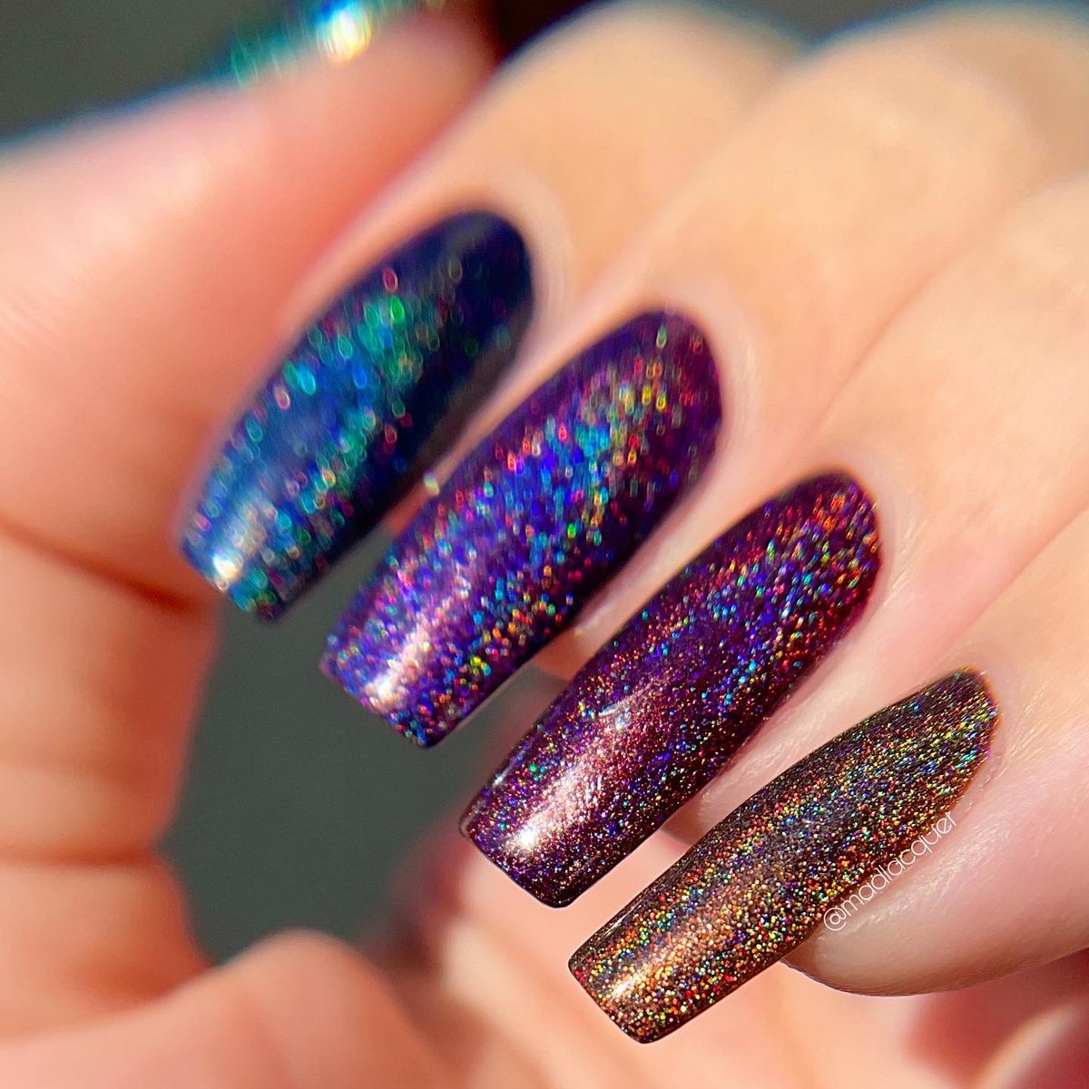 madlacquer's tweet photo. The sun finally came out for a bit, so my macro lens and I went outside to enjoy it ☀️🌈
(Also, I love this @holotaco dark rainbow skittle so much, I couldn’t not properly photograph it!)

@nailogical #holotaco https://t.co/PTVFpt3IJ0