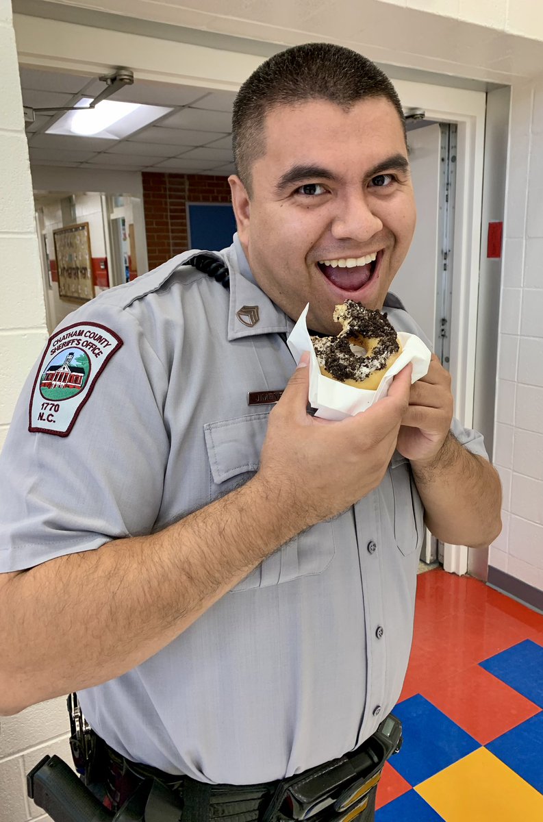 wwphillipsedu's tweet photo. Not to be too cliche, but our awesome SRO sure enjoyed his donut this morning. 🤪  We sure are thankful to have him here. @JswCubs #onechatham https://t.co/tKz6eytgPK