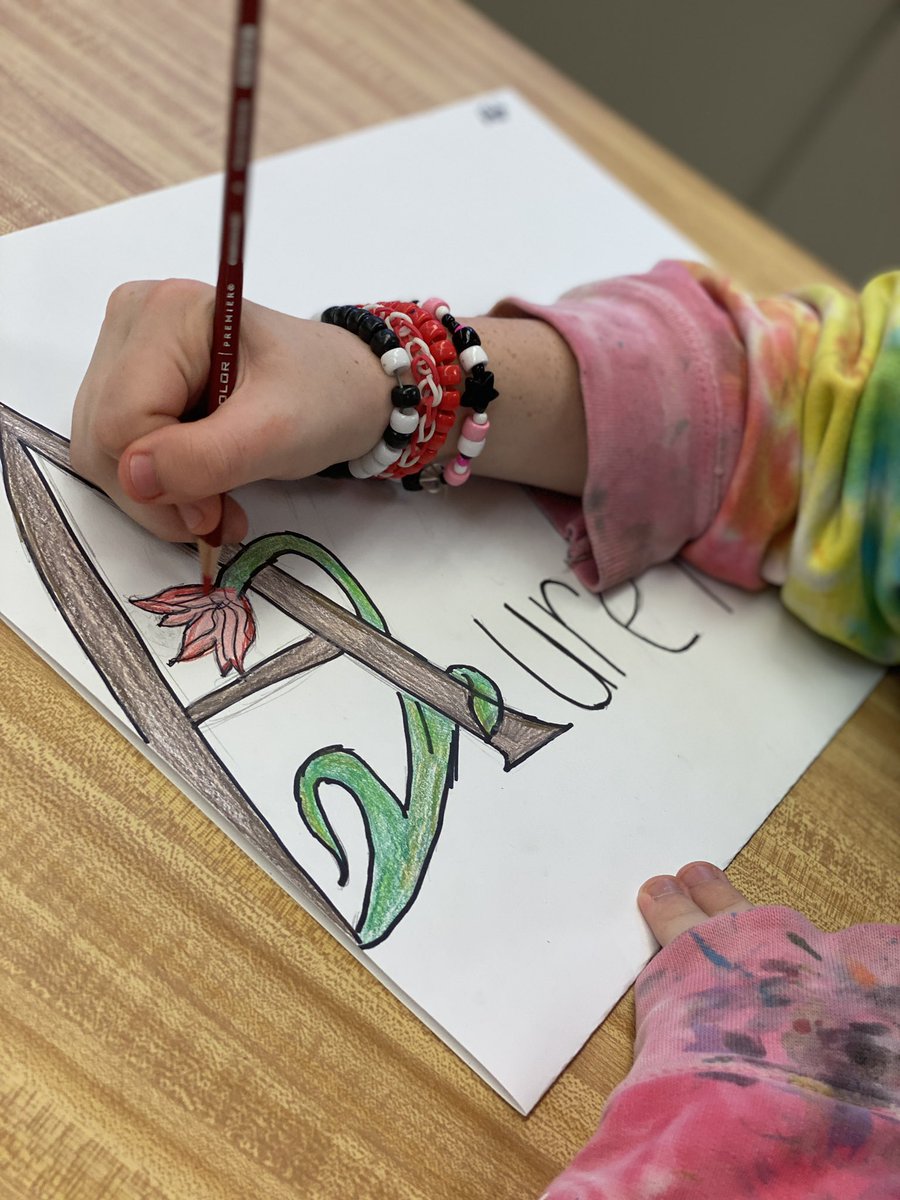 6th grade is working on lettering art for their art folders!