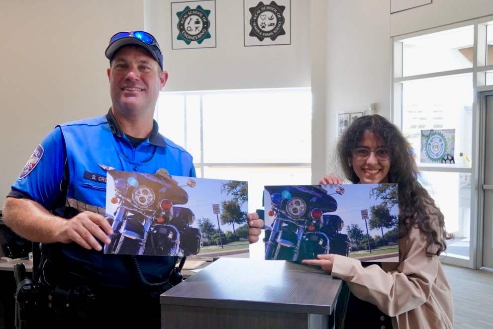 KCAL_KISD's tweet photo. Mary Bakhoum, senior @ KHS, took an amazing pic of Traffic Officer Brent Cross' motorcycle. We made 2 copies here in our print shop, &amp; now 1 will hang in the Keller PD Traffic Office! 
#kcal #kellercenterforadvancedlearning #celebratekisd #CTEinKISD #theKCALconnection #kellerpd https://t.co/tCzUcCKFPI