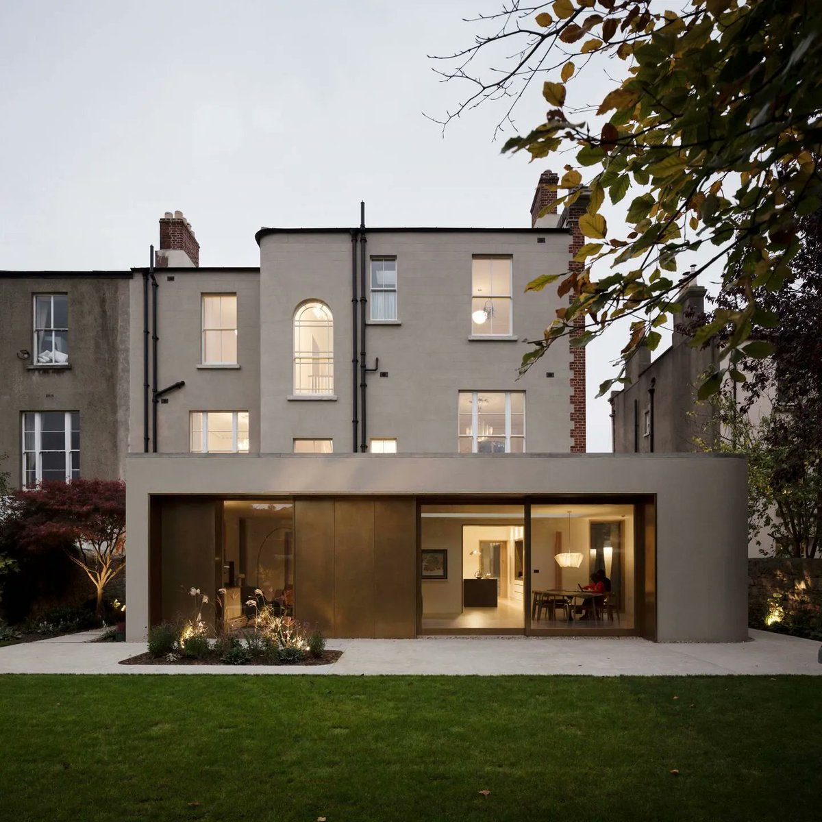 Dublin Rathgar Private House by <a href="/plaarchitects/">PLA Architects</a> features a material palette of:

• Facade panel, window and door frames by <a href="/KMEGermanyGmbH/">KME Germany GmbH</a> 
• Lighting by Mazzega; Pinch Design
• Bathroom fittings by Porter Bathrooms

See more: bit.ly/2Yno2Ju