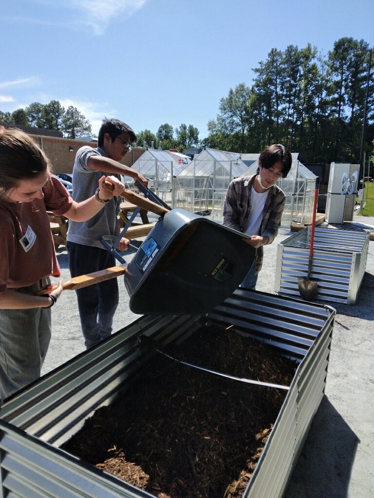 Celebrating our partnership with ⁦<a href="/We_Are_GSMST/">GSMST</a>⁩. Interns working to prepare our gardens for 1st grade’s PBL! Engagement lives here!