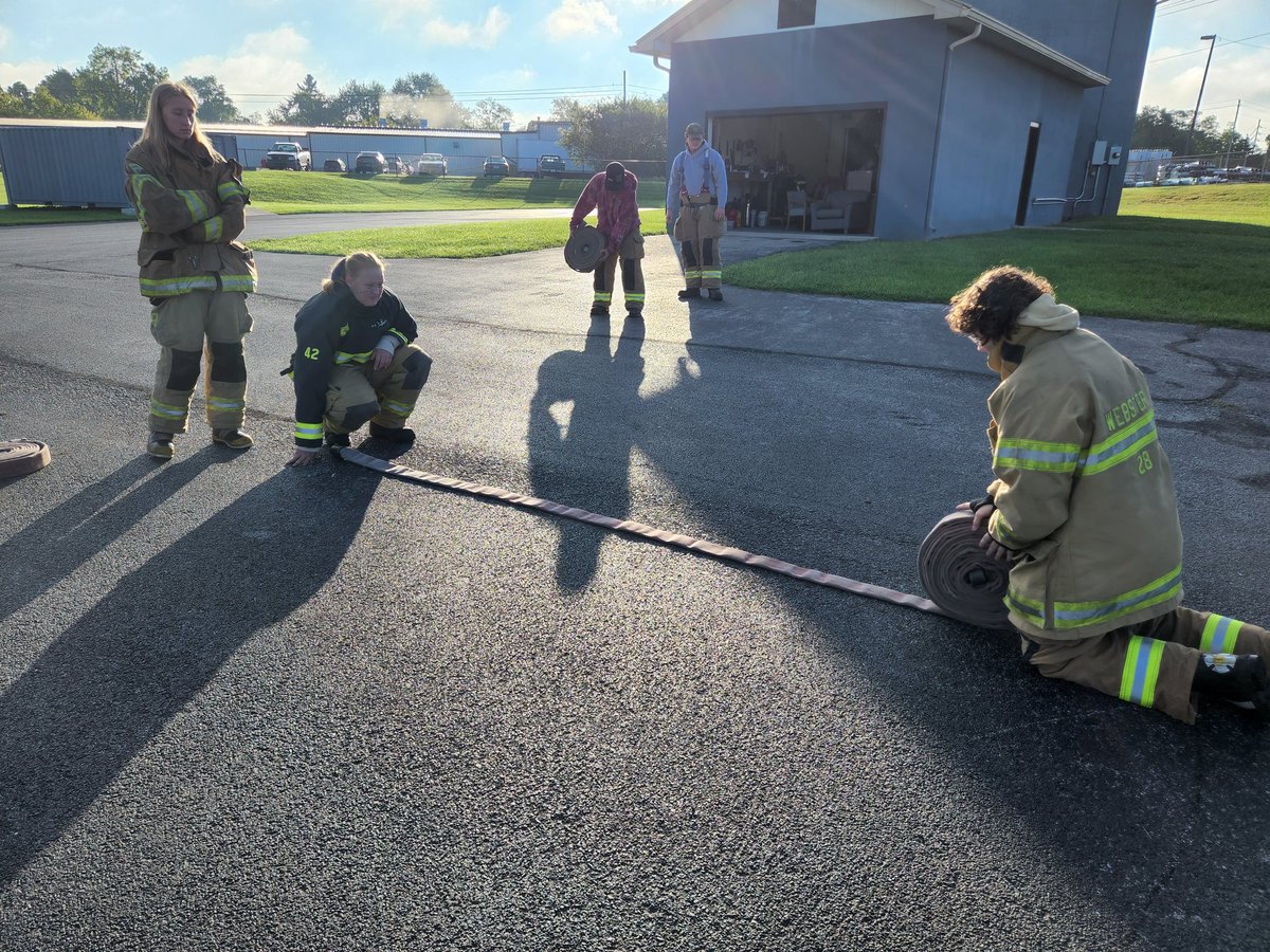 Today students learned four hose rolls.  How to roll them and how to deploy them.  Our class is divided into four Engine companies. Each company has four members.  Tomorrow pics will be more hose rolling pics a post from each company.