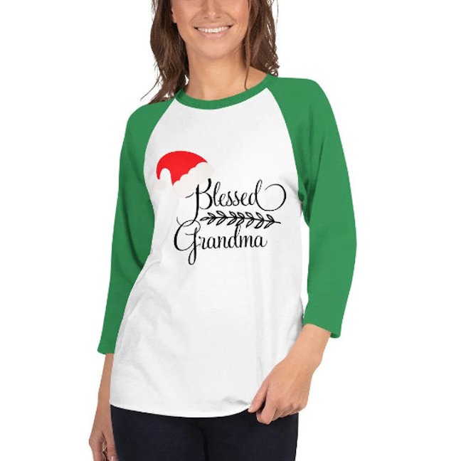 Blessed Grandma Raglan Jersey, Christmas Jersey, Choice of Color and Size #JnJGiftsnCrafts #giftsforalloccasions #blessedgrandmaraglanjersey #christmasjersey #holidayjersey #choiceofsize #uniquechristmasgift #grandmagift  etsy.me/3Bde0OG