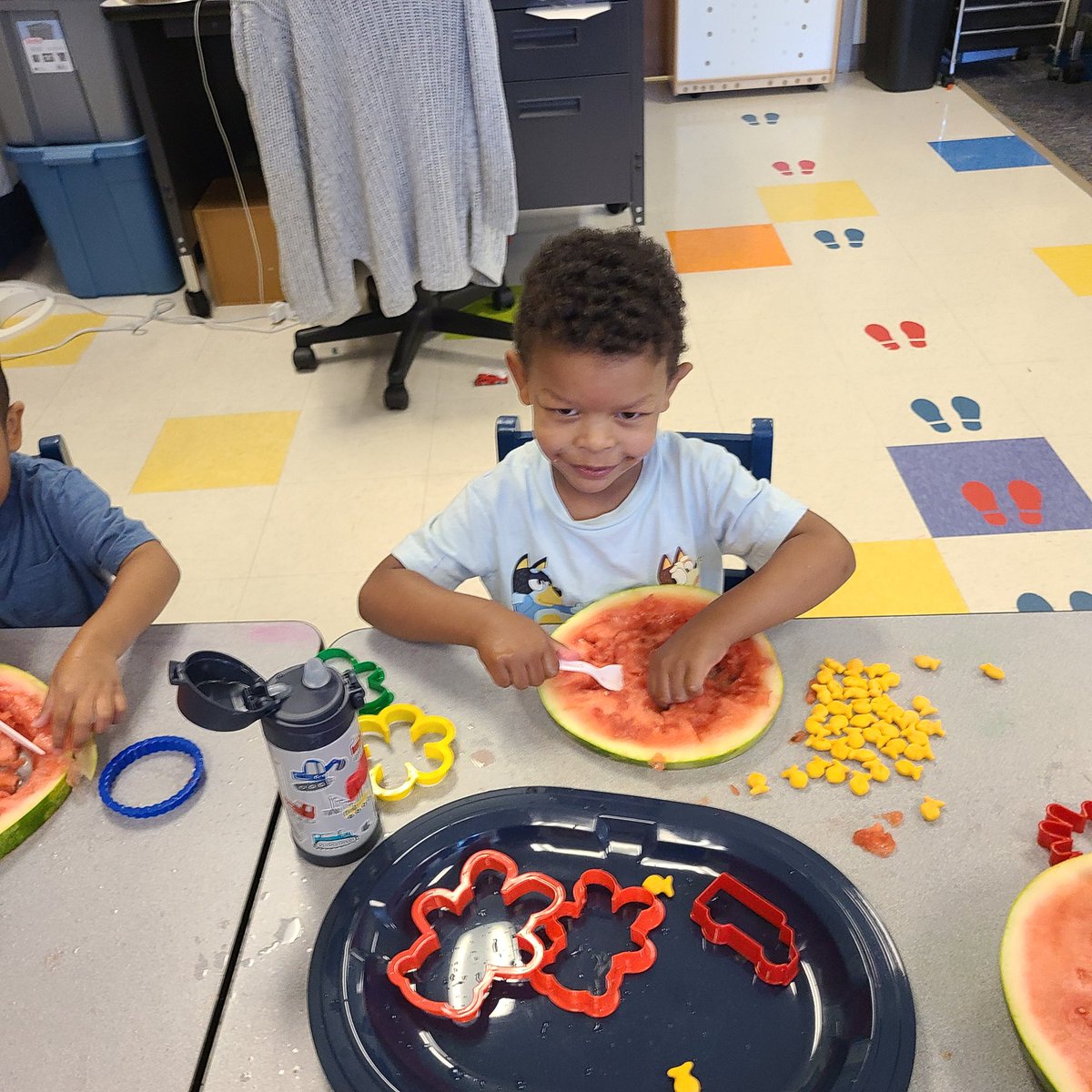 Today in the wonderful world of prek, we used a knife (with an adult) to cut circle slices from a watermelon. Then we took cookie cutters, plastic cutlery and cut and scooped our own watermelon slice. Then we ate it as we cut and scooped. Yum! <a href="/ScottsRidgeES/">Scotts Ridge ES</a> #finemotor