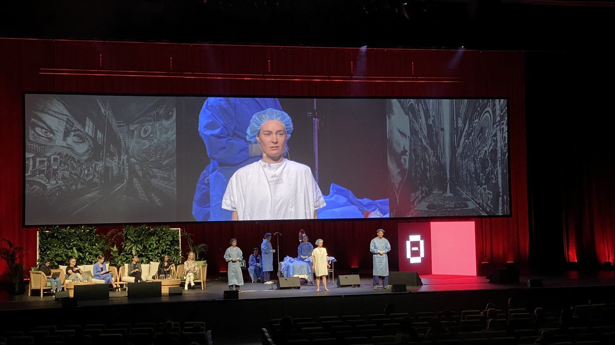 DrEricLevi's tweet photo. #CODA22 panel with an illustrative simulation of conversations on gender issues around the surgical operating table. Patient (actor) says, ���I see all these male doctors talking about my breast cancer without seeing me as a woman.” @codachange https://t.co/hrPo5BQbyg