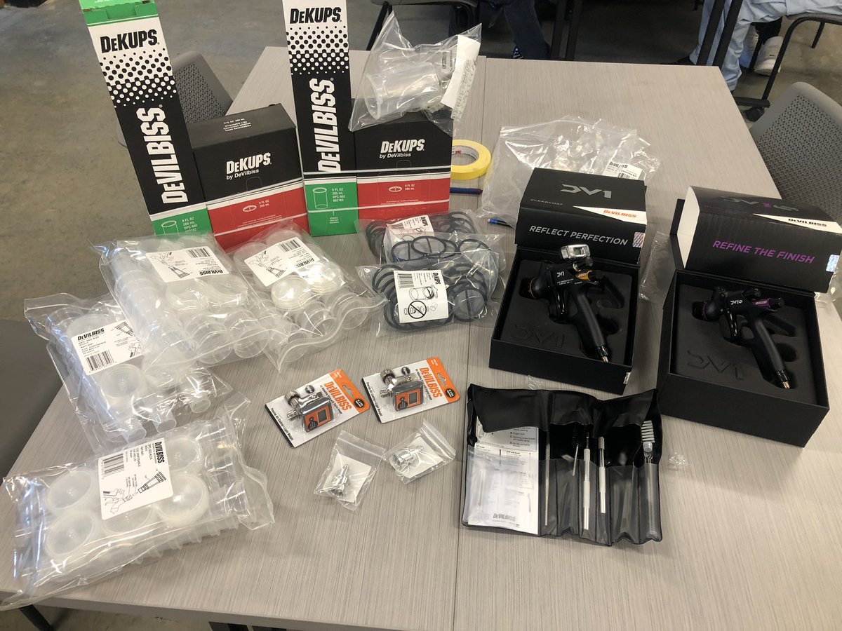 TeccW_Collision's tweet photo. What an awesome surprise! I knew DeVILBISS was giving me some cups but definitely didn’t expect 2 of their new spray guns. Thank you so much Kelsey for supporting our students! @killerBeeyo @devilbiss_refinish https://t.co/V2HuPH3EaP