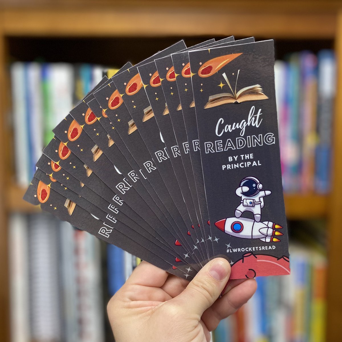 During arrival this morning I caught two students in a reading emergency and it gave me an idea to create these bookmarks! @canva is seriously one of my favorite tools! #LWRocketsRead #LWRockets #momsasprincipals #iledchat #principalsinaction