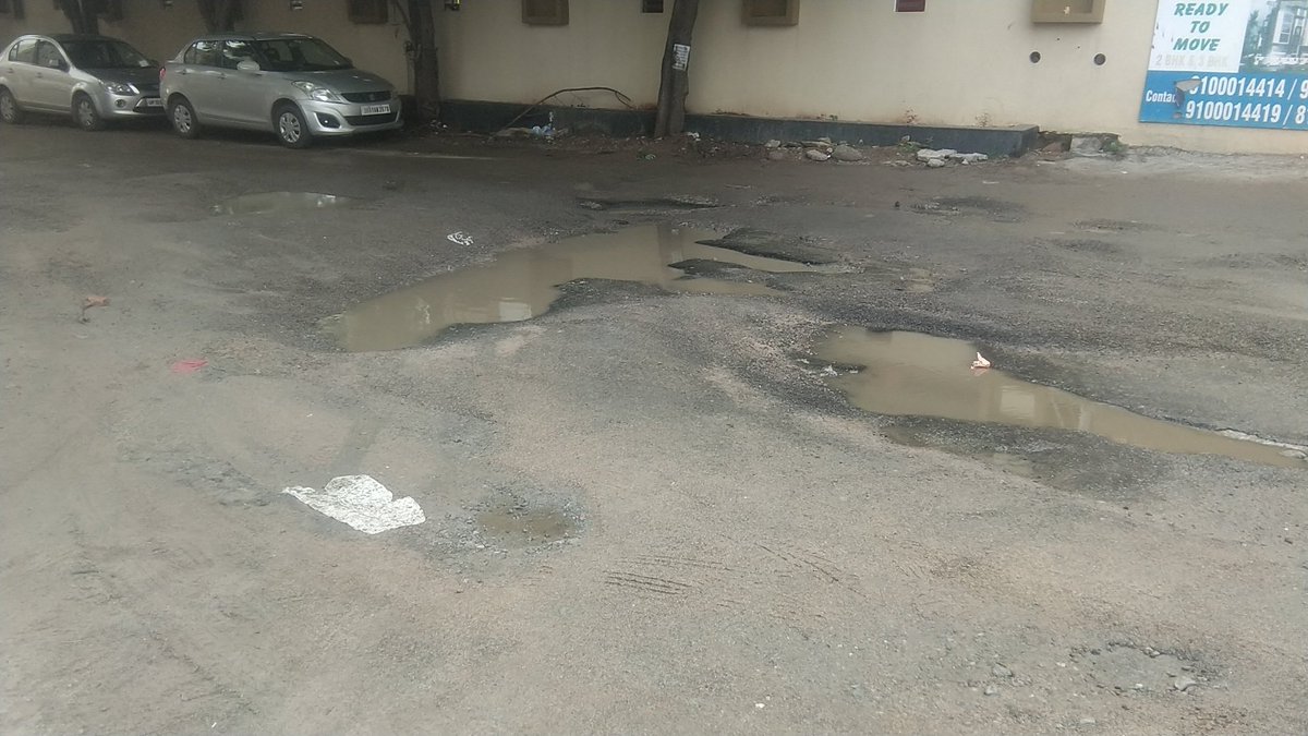 anilkare's tweet photo. @GHMCOnline readymix was being used to fill the area here, but it was coming off and creating lumps and made the road very uneven. Kallu compound road, maszid banda, kondapur. https://t.co/RcBdIv6HSP
