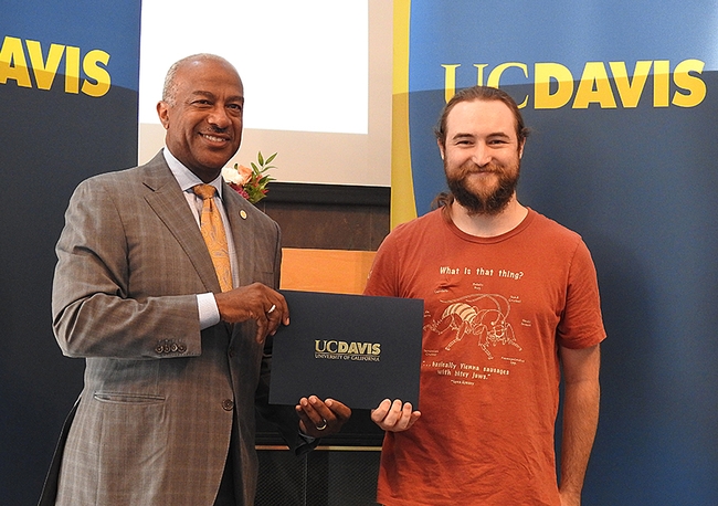 Meet Brennen Dyer of Bohart Museum of Entomology, one of the #ucdavis staff honored at the Staff Assembly awards program. Check out his "J. Cricket" t-shirt. Here's what #ucdavis Chancellor Gary May said in his remarks. #BugSquad bit.ly/3QJjBlg