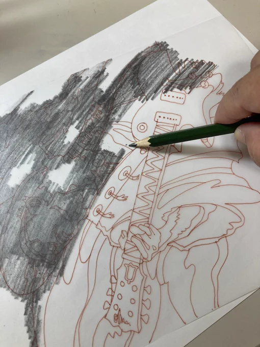 古の技法で下絵を転写しているところ 