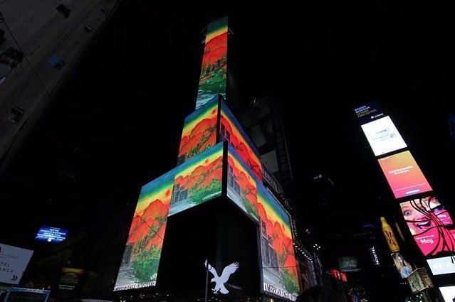 ProjectTupac's tweet photo. Tupac and Elton John collaborate together on “Ghetto Gospel” Illuminated a 42 story building in Times Square N.Y. In honor of Tupac! Project Tupac doing my part to keep Tupac’s Lyrical Messages Alive! #Tupac #Projecttupac #2Pac #EltonJohn https://t.co/RcNLQWRx4k