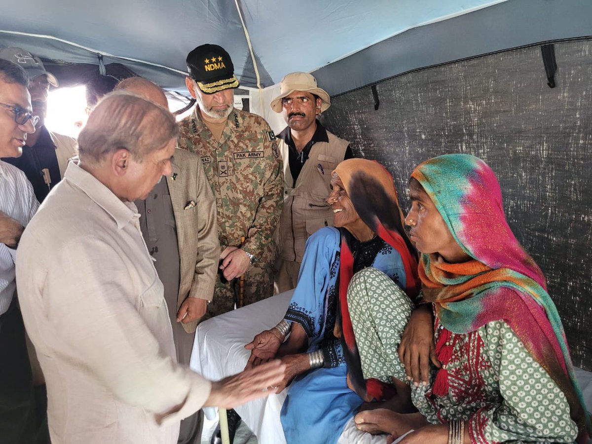 Prime Minister Muhammad Shehbaz Sharif interacting with the flood affectees during his visit to flood relief camp of Suhbatpur/Balochistan