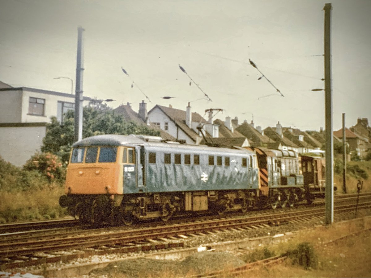 miles_chains's tweet photo. From the days when my camera gear wasnβt up to much, neither was my photography! 81003 Passes through Hest Bank with class 08 and brake van in tow. #Class81 #HestBank #WCML #BritishRail #Trainspotting https://t.co/LGLdlKeMYU
