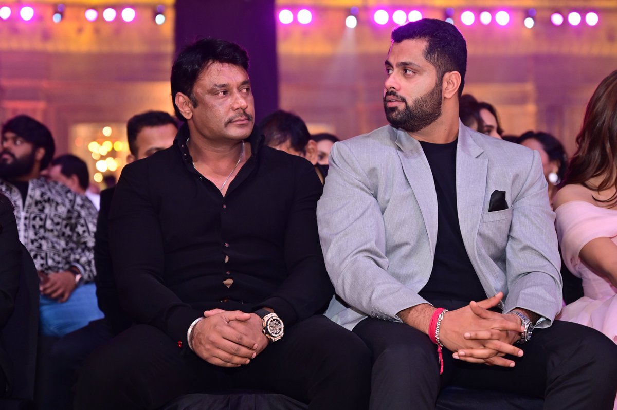 SIIMA (@siima) on Twitter photo Elegance personified at #SIIMA2022 by none other than <a href="/dasadarshan/">Darshan Thoogudeepa</a>
<a href="/Wolf777news/">Wolf777News</a>
<a href="/ConfidentGroup1/">Confident Group</a>
<a href="/officialskyexch/">SkyExch</a>
<a href="/HonerHomes/">HONER HOMES</a>
<a href="/BharathiCements/">Bharathi cement</a>
<a href="/GalaxyChocolate/">Galaxy Chocolate</a>
<a href="/Hindware_India/">Hindware</a>
<a href="/EaseMyTrip/">EaseMyTrip.com</a>
<a href="/CocaCola/">Coca-Cola</a>
<a href="/ParleFamily/">Parle Products</a>
<a href="/canarabank/">Canara Bank</a>
#10YearsofSIIMA #SIIMA2022 #SIIMA #NVYTv #HarmonyCity Elegance personified at #SIIMA2022 by none other than <a href="/dasadarshan/">Darshan Thoogudeepa</a>
<a href="/Wolf777news/">Wolf777News</a>
<a href="/ConfidentGroup1/">Confident Group</a>
<a href="/officialskyexch/">SkyExch</a>
<a href="/HonerHomes/">HONER HOMES</a>
<a href="/BharathiCements/">Bharathi cement</a>
<a href="/GalaxyChocolate/">Galaxy Chocolate</a>
<a href="/Hindware_India/">Hindware</a>
<a href="/EaseMyTrip/">EaseMyTrip.com</a>
<a href="/CocaCola/">Coca-Cola</a>
<a href="/ParleFamily/">Parle Products</a>
<a href="/canarabank/">Canara Bank</a>
#10YearsofSIIMA #SIIMA2022 #SIIMA #NVYTv #HarmonyCity