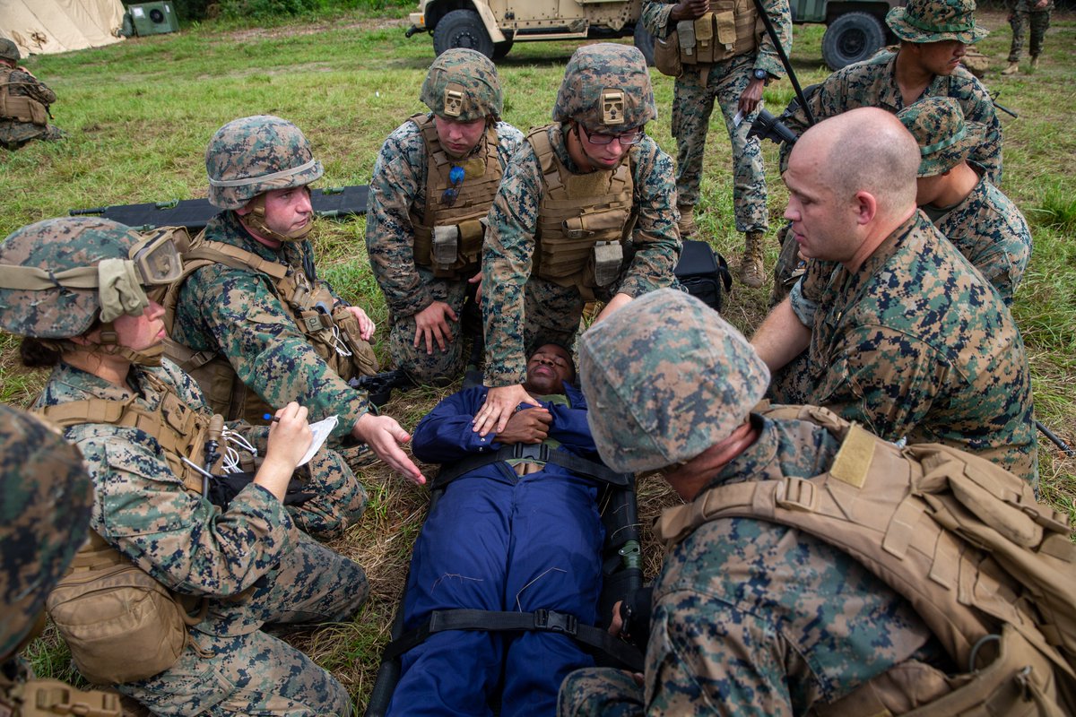 MARFORCOM's tweet photo. #Marines & @USNavy #Corpsmen w/ @2ndMLG, assess a simulated casualty during a #MCCRE on Camp Lejeune, N.C., to demonstrate #combatreadiness before a change of operational control to the @26MEU.
(#USMC photos by Sgt. Christian M. Garcia)
#WeHaveTheWatch #AlwaysReady #JointForce https://t.co/jTJfumhyCD