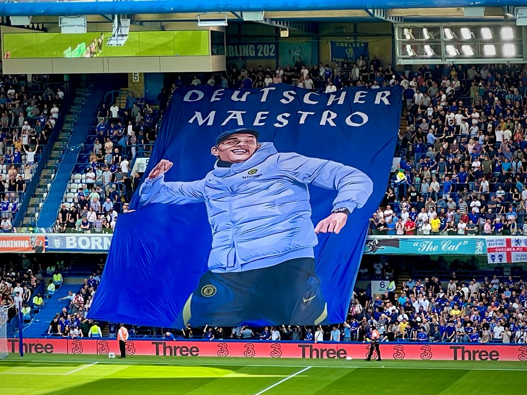 WeAre_TheShed's tweet photo. Tonight will be our first game since Thomas Tuchel got sacked

We will not be using the crowdsurfer out of respect to The Queen's passing/pre match plans

Instead, we're encouraging people to stand &amp; applaud on the 21st min to say 'thank you' (the year he won us the CL) https://t.co/JZLHxozjCp