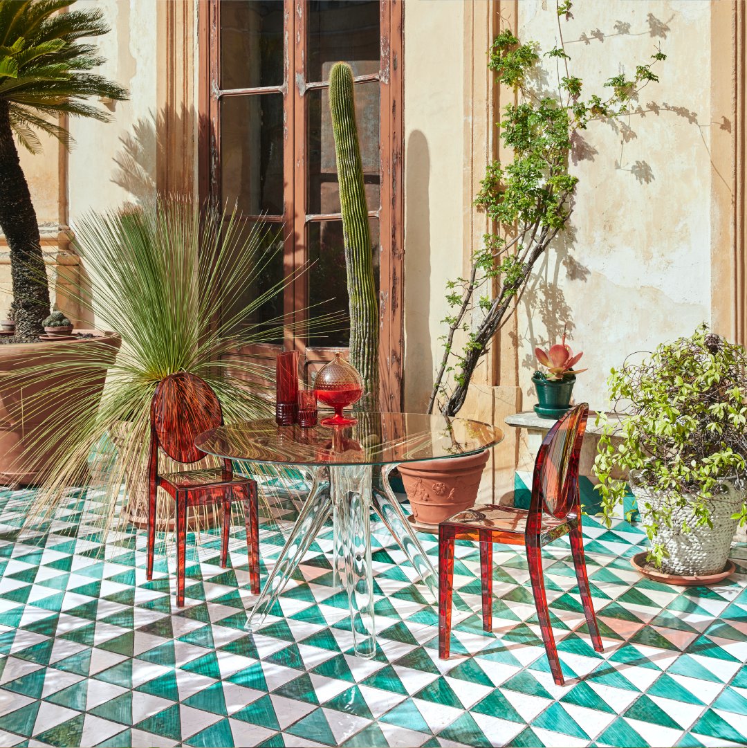 KartellOfficial's tweet photo. Victoria chairs in intense amber color combine with Sir Jo table in a harmonious vision within the splendid terrace of Palazzo Gangi.

#Kartell #kartelllovestheplanet #kartellwander https://t.co/tuQCjwoLQg