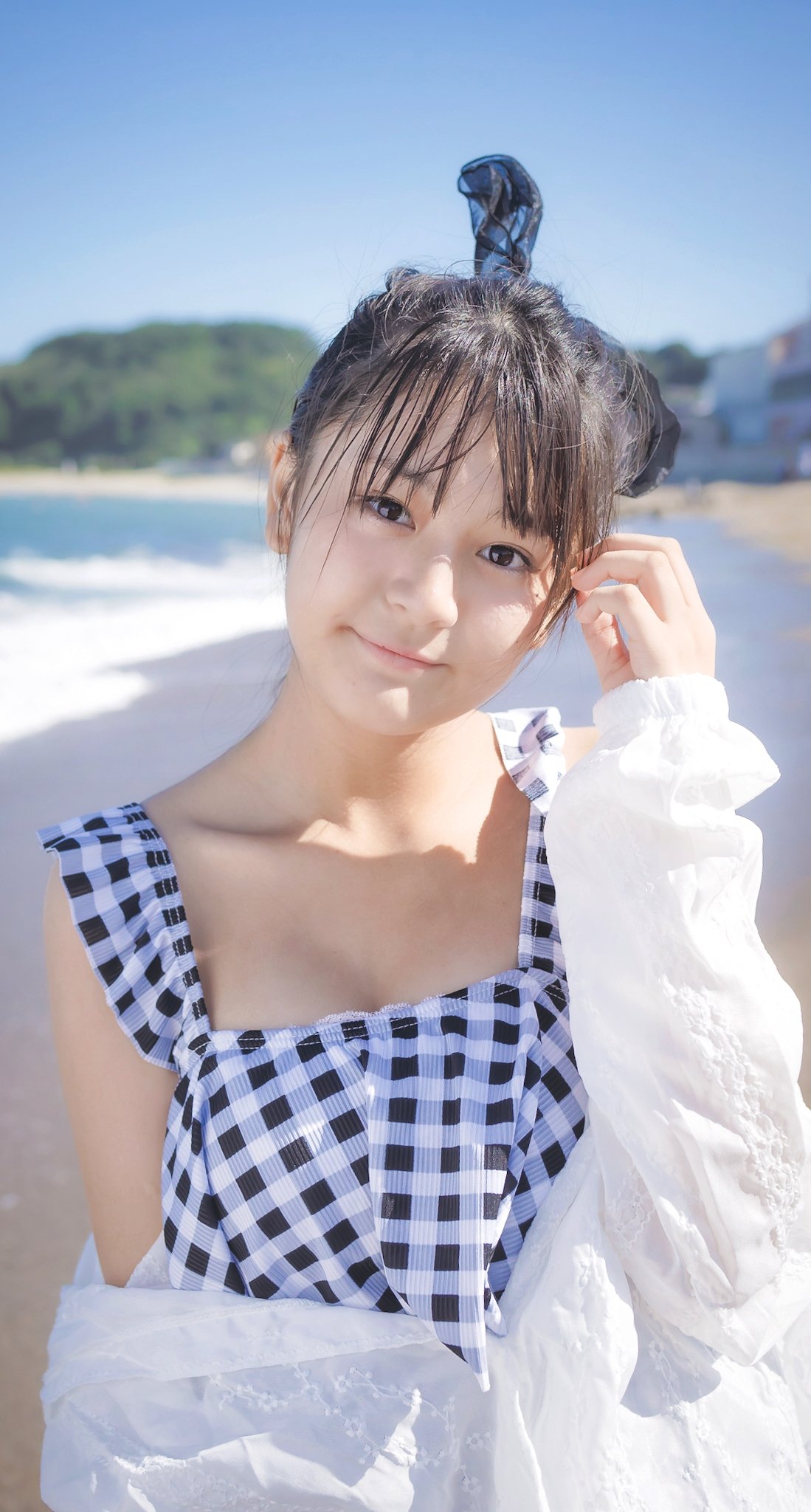 伊與田綾音  