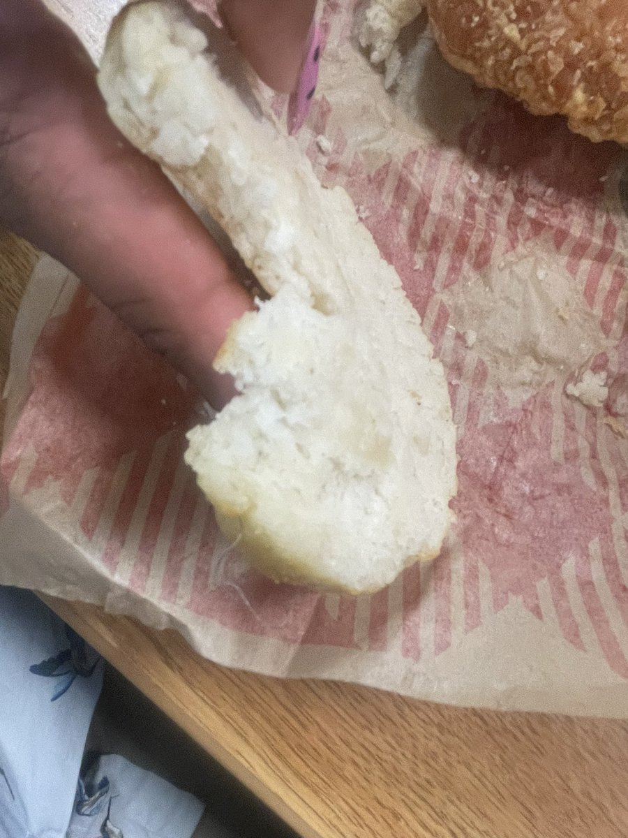 ItsMeToi's tweet photo. As a #NC native I’ve always been a fan of @Bojangles breakfast. This morning they decided to give me a little extra with my Cajun Filet Biscuit. There is a piece of wire/string baked into the bread, literally baked in between the dough!! Thank you Jesus I didn’t bite into it!🤮 https://t.co/KfVycsT2gr