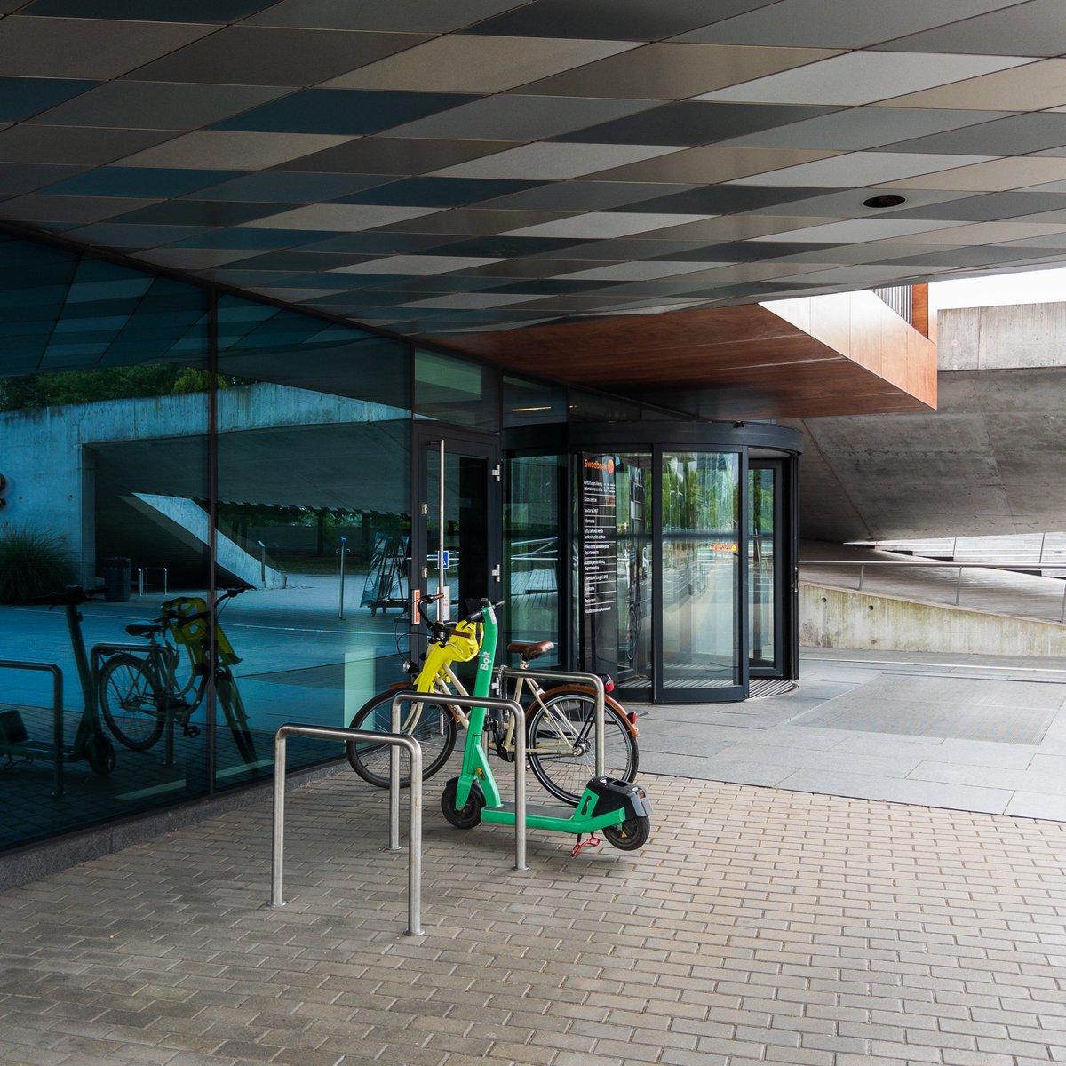 HubkeepApp's tweet photo. More bike parking should be architecturally sheltered like that. Such a small thing to consider when designing a building, but such a big difference for those who use it. https://t.co/LcGGM1nvP6