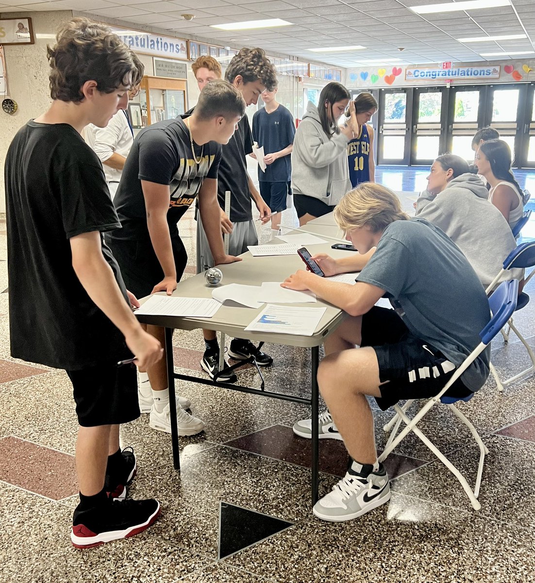 DebLangoneEdu's tweet photo. Not enough room in the classroom? No problem! AP Physics students ventured into the hall to conduct their robotics experiment with Sphero. #WIpride https://t.co/06KPenyNgc