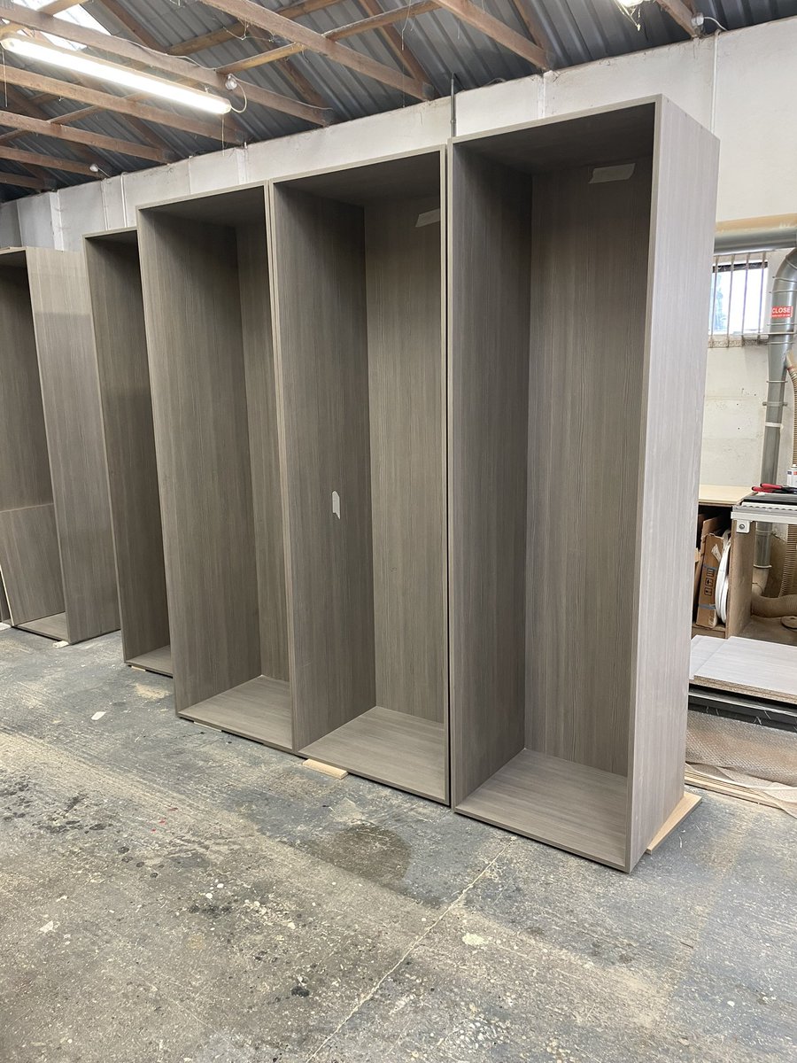 EliteConst1's tweet photo. The cabinetry for a walk-in wardrobe project finished in Egger green grey Avola starting to take shape. https://t.co/nocCd8fJja
